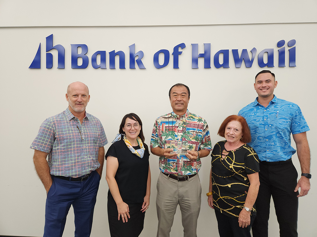 (From left) John; Leon Guerrero, Mark Tokito, senior vice president and manager for the Guam Commercial Banking Center for Bank of Hawaii; Maratita; and Michael Sakazaki, vice president and West Pacific Market manager, Bank of Hawaii.