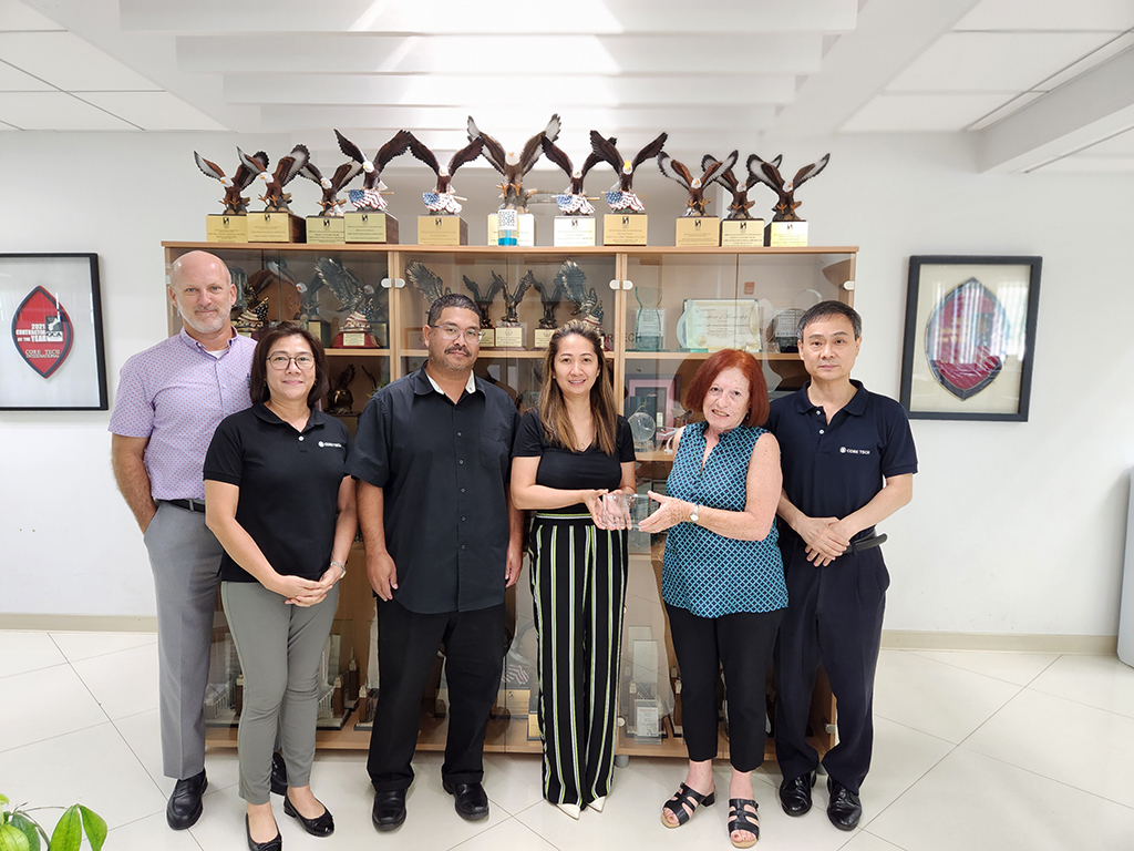 (From left) John; Conchita D. Bathan, CEO of Core Tech International Corp.; Kalistus Rengiil, vice president/Corporate Banking Group manager, representing Bank of Guam; Johann Cruz, chief financial officer, Core Tech; Maratita; and Ho Eun, chairman, Core Tech.