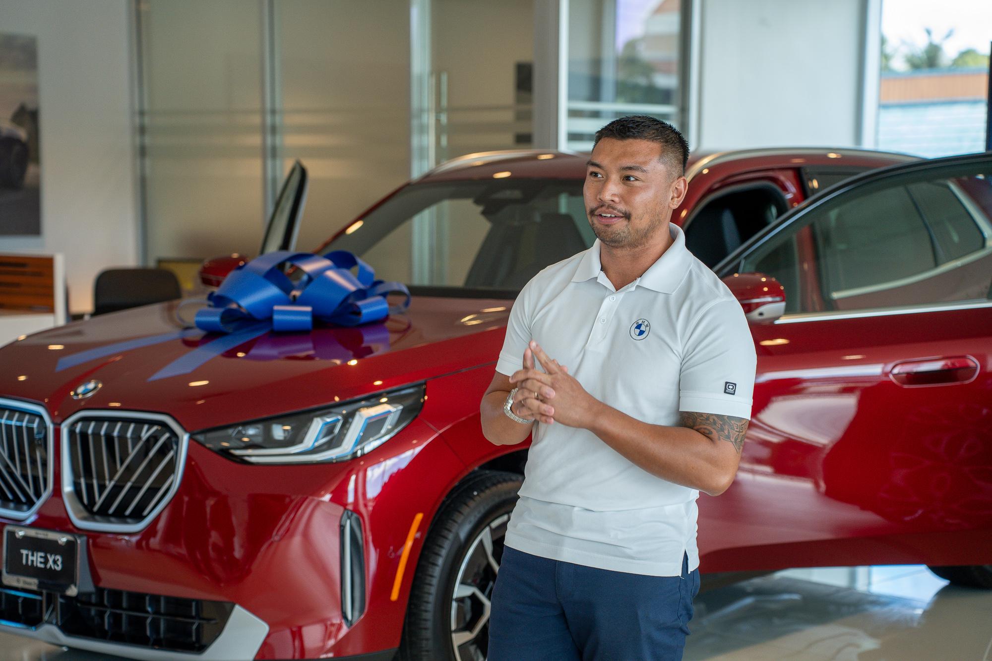 Carlo Guanlao, BMW automotive consultant, Atkins Kroll. Photo by Skyler Obispo. 