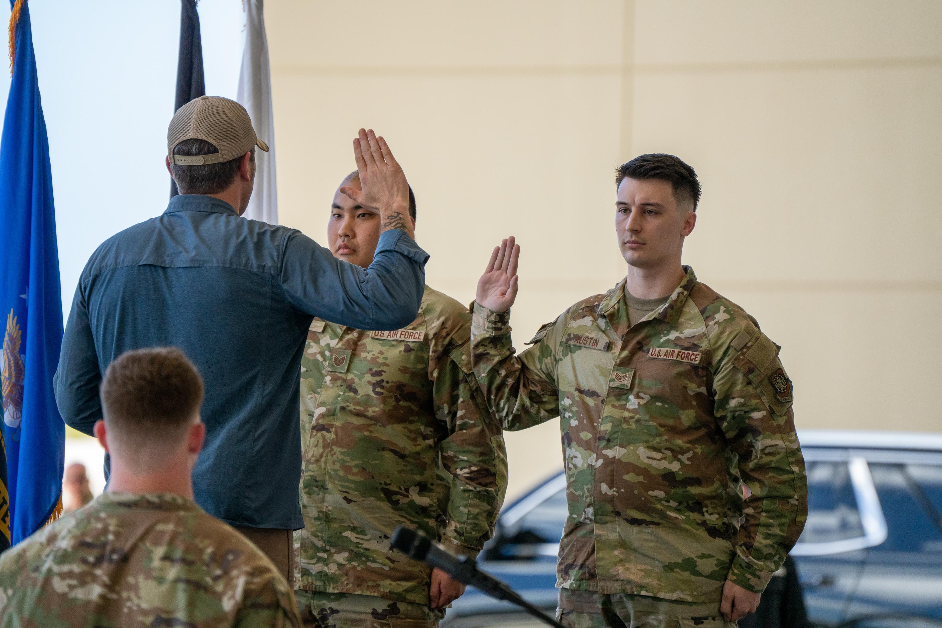 Hegseth administered the swearing of reenlistment for several servicemen stationed on Guam. Photo by Skyler Obispo. 