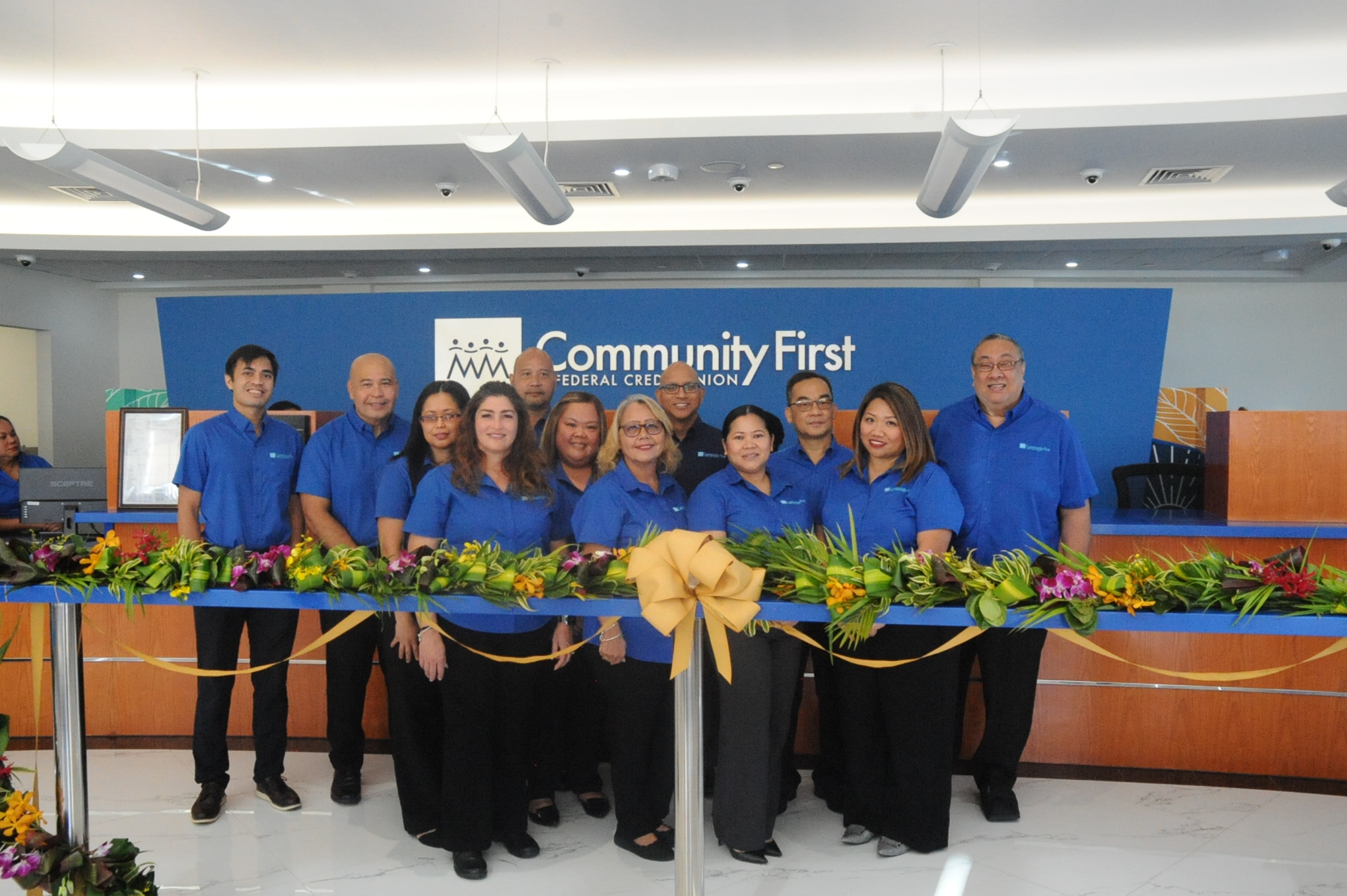 (From left) Derek Mandell, assistant vice president/marketing manager; Peter Palomo, senior vice president/CIS and facilities officer; Emma Tan, assistant vice president/senior internal auditor; Carla Lorenzo, vice president/director of operations; Rick Scroggs, vice president/business development officer; Romena Nivera, assistant vice president/ human resources manager; C.Mae Tuncap, senior vice president/chief operational risk officer; Gerard Cruz, president and CEO; Dulce Taladoc, assistant vice president/accounting manager; Augustus Veloria, vice president/controller; Chona Atalig, assistant vice president/compliance manager; and Michael Finona, senior vice president/chief operations officer, all with Community First.