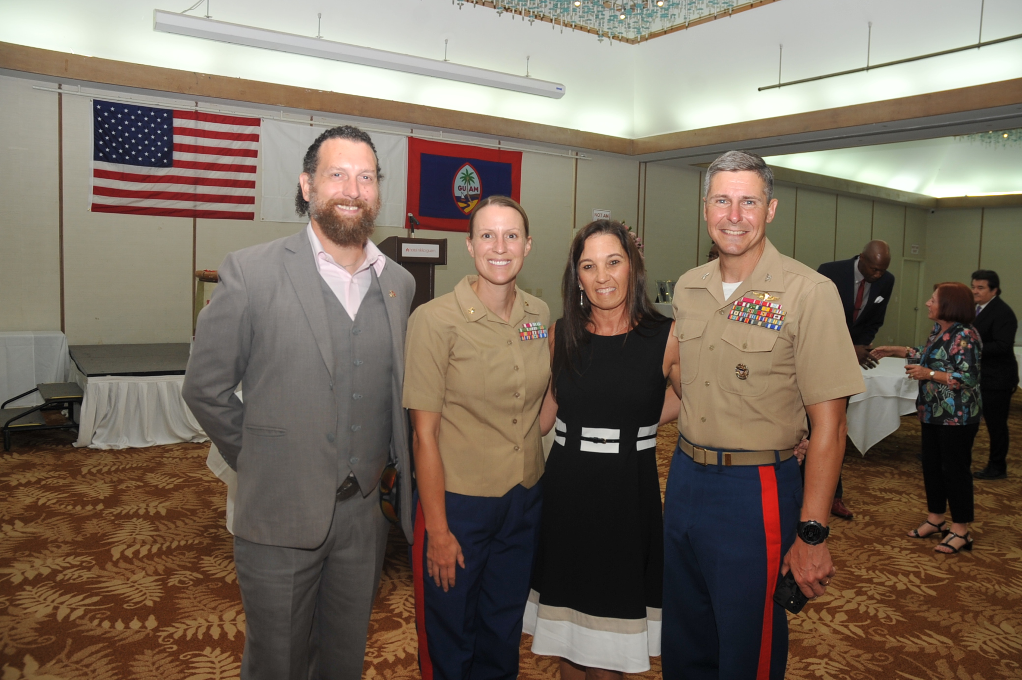 (From left) David Rosenfeld, Melissa Bopp, Col. Christopher L. Bopp, commanding officer, Marine Corps Base Camp Blas, Maj. Diann M. Rosenfeld, with Marine Corps Base Camp Blas communications strategy and operations.