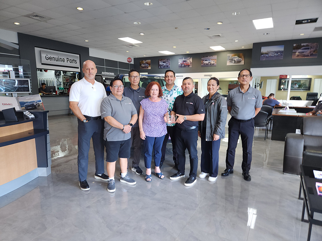 (Back row from left) John; Bobby Gopez, parts director with Monster Auto Corp., which does business as Guam AutoSpot; Cook; and (front row from left) Frank Preuc, inventory manager with Guam AutoSpot; Maratita; Derek Muna Quinata, president and CEO; Lisa Torres, sales manager; and Fred Cardinas, service director, all with Guam AutoSpot.
