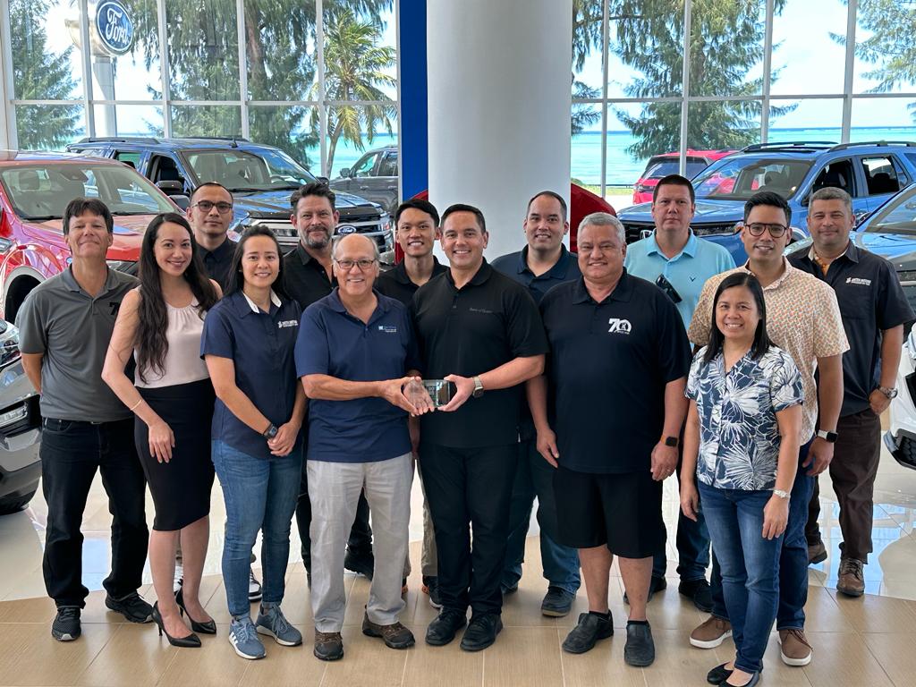 (From left) Norman Peter Tenorio, vice president, Joeten Motors; Patty T. Palacios, generalmanager, The Athlete&#039;s Foot, Boarderline, and All Star Sporting Goods; Sidney Quan, Ace Hardware; Somia T. Quan, president, Joeten Motors; Matthew Deets, vice president/general manager, Joeten Motors; Norman T. Tenorio, member of the Board of Directors, Joeten Enterprises Inc.; Shigeki Tenorio, operations manager, Pacifica Insurance Underwriters; Cook, JJ Tenorio, store manager/buyer, J.C. Tenorio Enterprises; Clarence Tenorio Jr., head buyer, J.C. Tenorio Enterprises; Jose Tenorio, manager, Construction Material and Supply Inc.; Lois Manese, general manager, Ace Hardware; Roman “Bo” Tenorio Palacios, vice president, J.C. Tenorio Enterprises; and Ray Alvarez, sales manager, Joeten Motors.