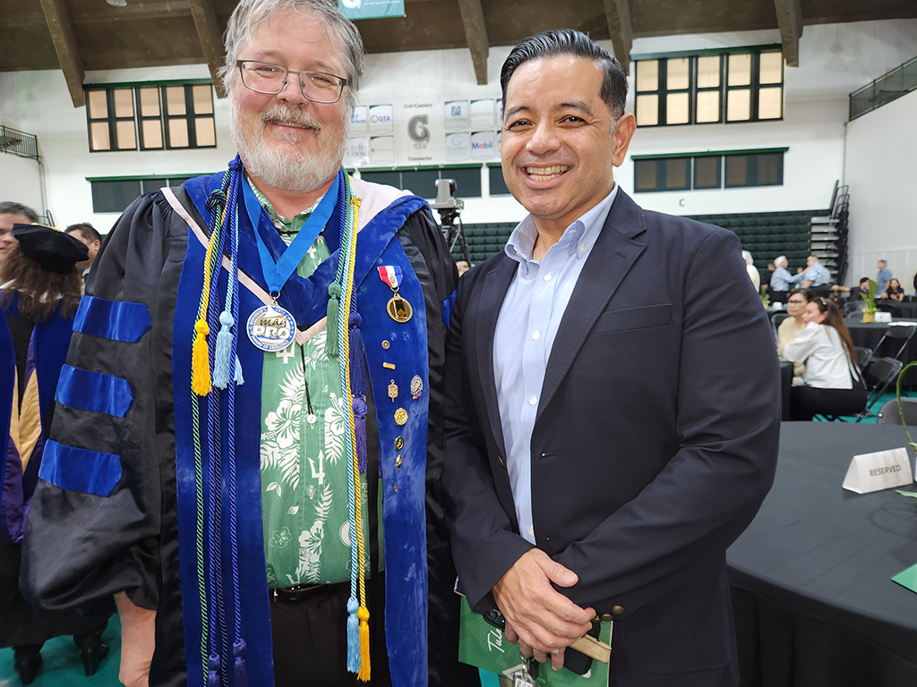 (From left) Ronald L. McNinch, associate professor of public administration, University of Guam; and Frankie Eliptico, vice president of administration and advancement, Northern Marianas College.