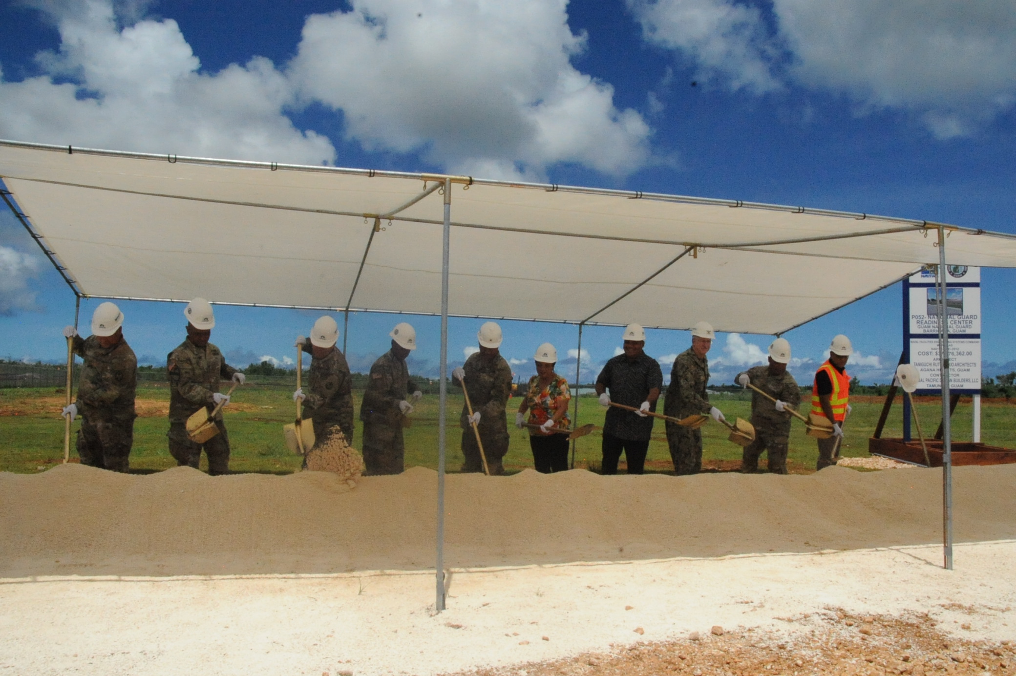 (From left) Maj. Gary Tanaka, construction and facilities management officer; Lt. Col. Manuel Duenas, commander, 105th Troop Command; Lt. Col. Michael Chen, state aviation officer; Command Sgt. Major Celso Leonen, command senior enlisted leader; Brig. Gen. Michael W. Cruz, adjutant general, Guam National Guard; Gov. Lourdes A. Leon Guerrero; Lt. Gov. Joshua F. Tenorio; Capt. Troy Brown, commanding officer, Naval Facilities Engineering and Systems Command Marianas; Col. David Santos, chief of joint staff, Guam National Guard; and Charles Rios, general manager of Global Pacific Design Builders LLC. 