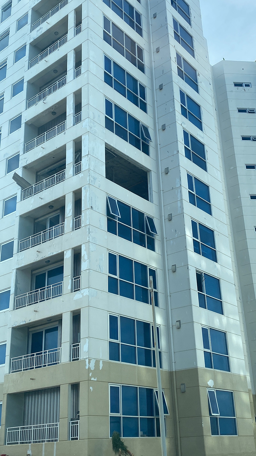 Windows were blown out at Summer Towers in Tamuning during Typhoon Mawar. Photo by Khyomara Santana