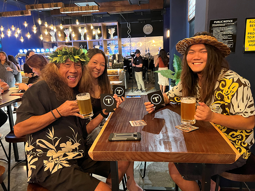 (From left) Saipan ukulele musician Larry Lee and his daughter Kanani and son Kui. 