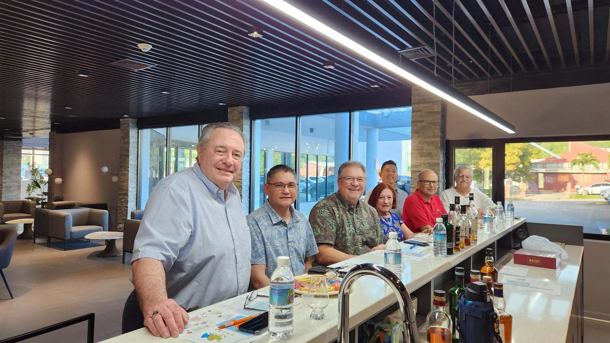 (From left) Robert J. Maloney, chairman and CEO, Peter Duenas, senior project manager, Jay R. Shedd, vice president, all from Pacific Data Systems; Maureen N. Maratita, publisher, Glimpses Media; Hynek Dvorak, project manager, exp; Andrew Park, general manager, Hotel Tano Guam; and Robert J. Marks, president, Hagatna Bay Consulting Inc.