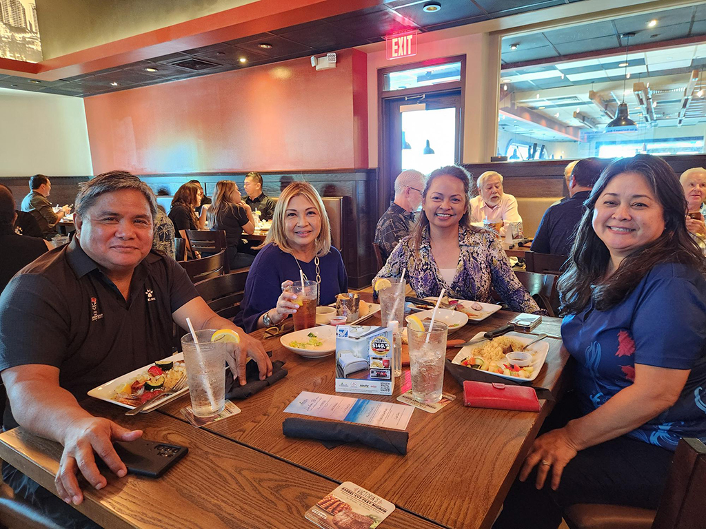 (From left) Valentino San Gil, president of the Guam Football Association; Marissa Del Rosario Tinsay, sales account manager, Paula Monk, director of sales, both with United Airlines; and Gloria Perez, executive assistant, Matson Navigation Co.